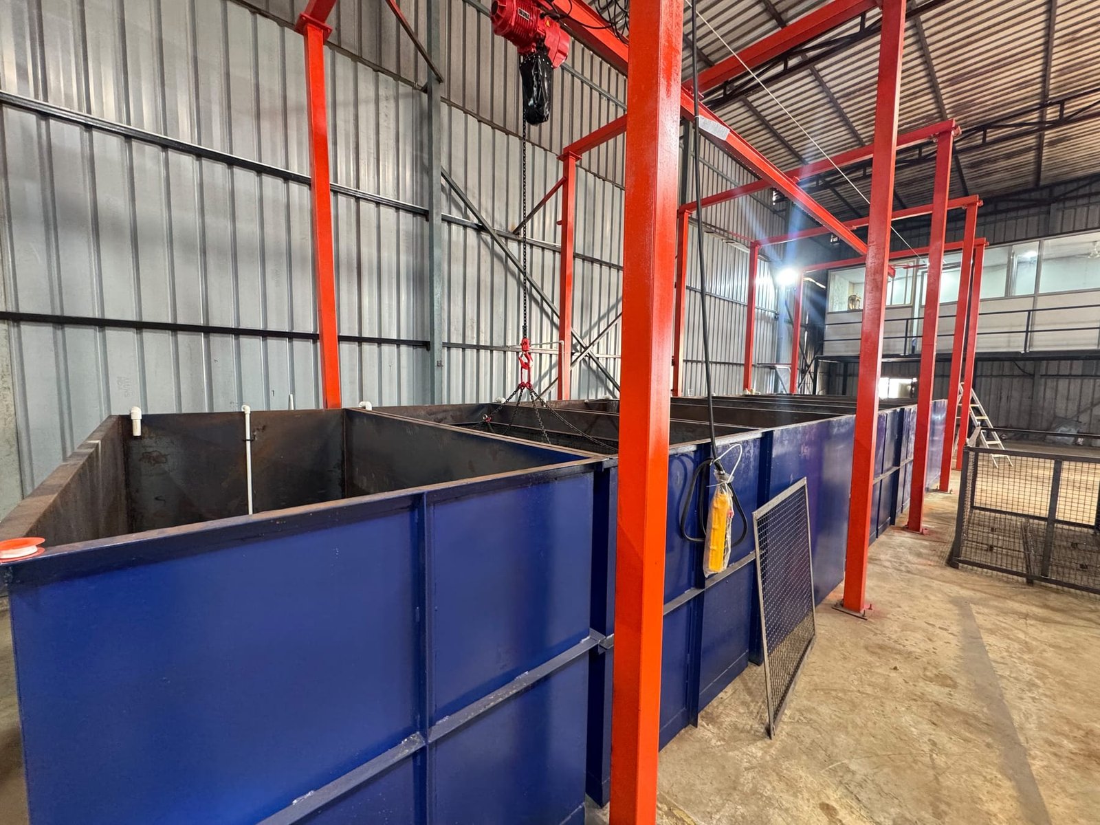 Shrinath Coatings' immersion tank line with overhead hoist, used for CED coating and pre-treatment